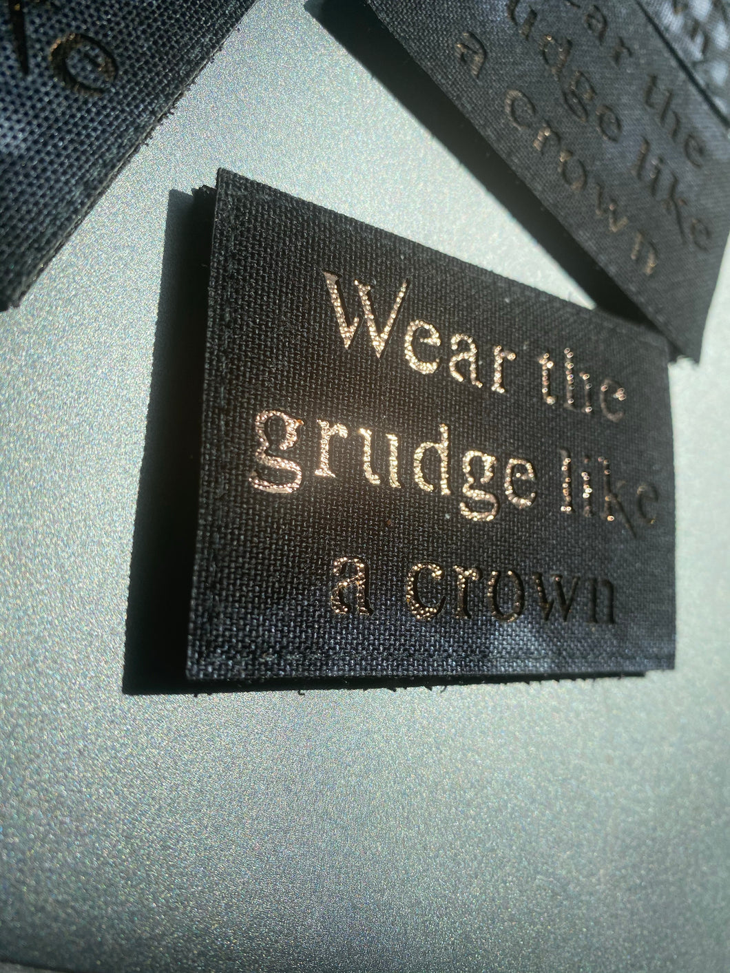 Tool lasercuts Grudge and Tempest(blue glow) Velcro back